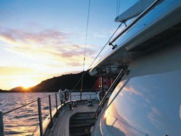 A Luxury Crewed Charter Yacht lying off a Greek Island